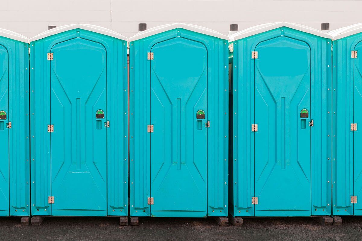 Industrial portable restroom units at a plant in Loveland, Colorado